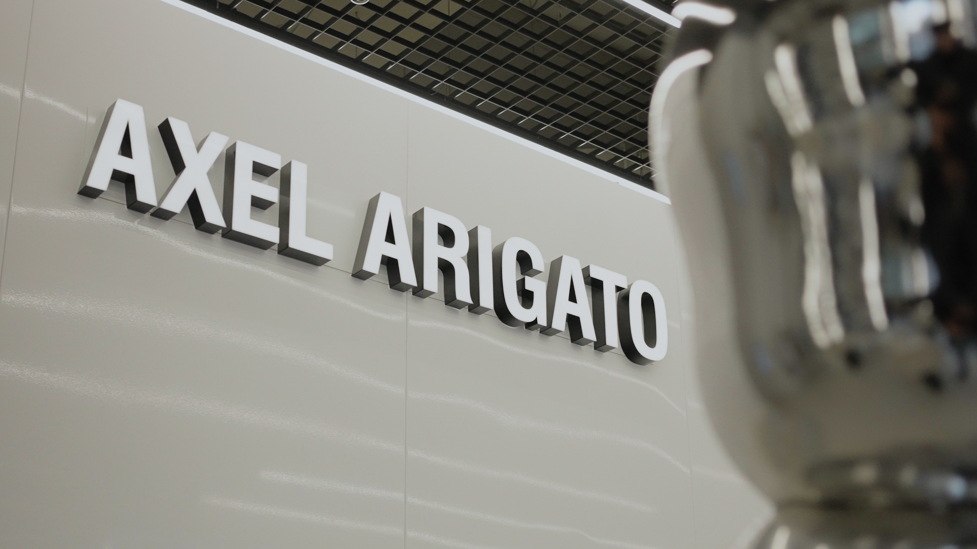 Axel Arigato store branding
